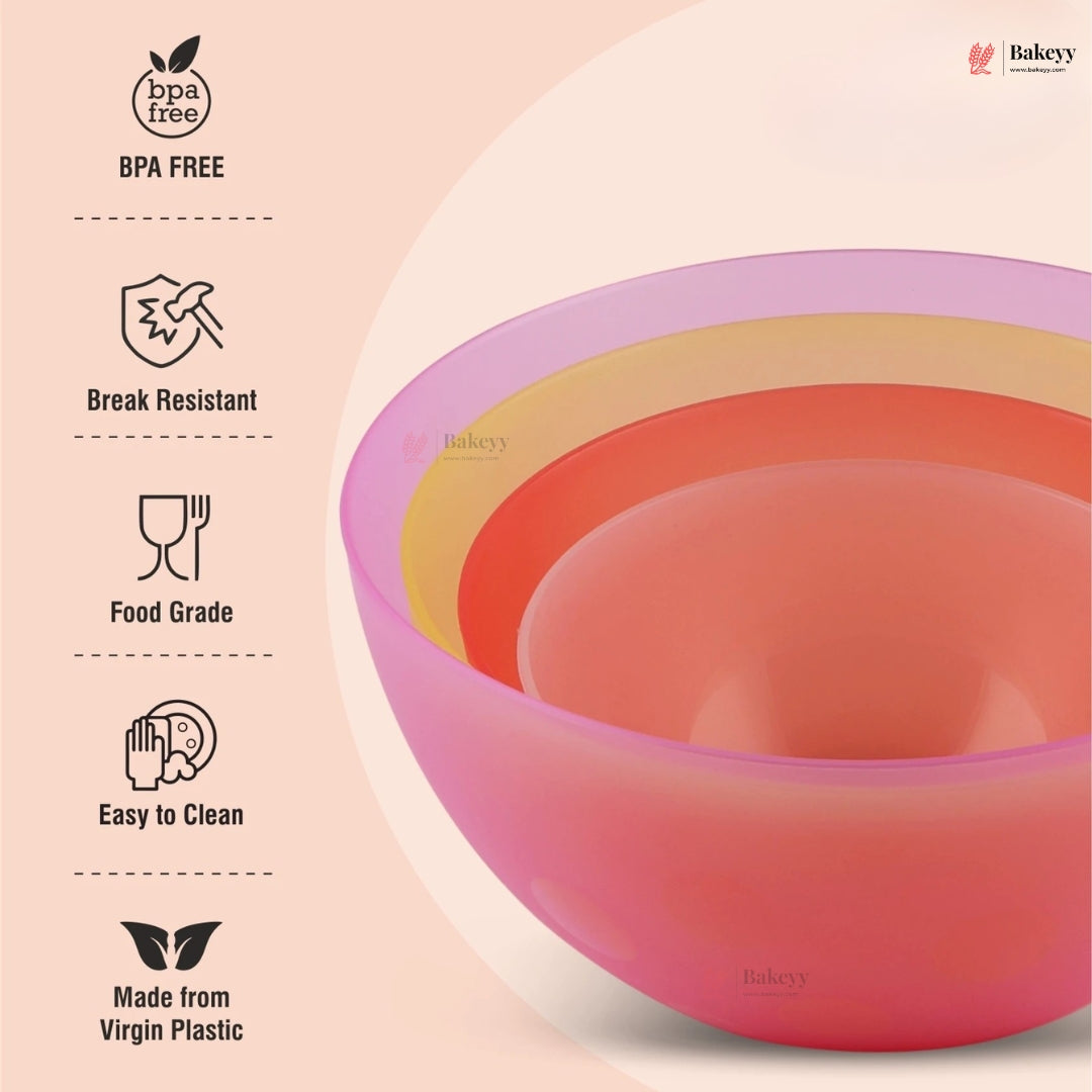 Set of colorful silicone bowls with BPA-free and other feature icons on a light pink background.