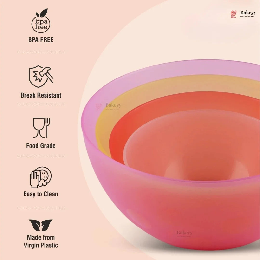 Set of colorful silicone bowls with BPA-free and other feature icons on a light pink background.