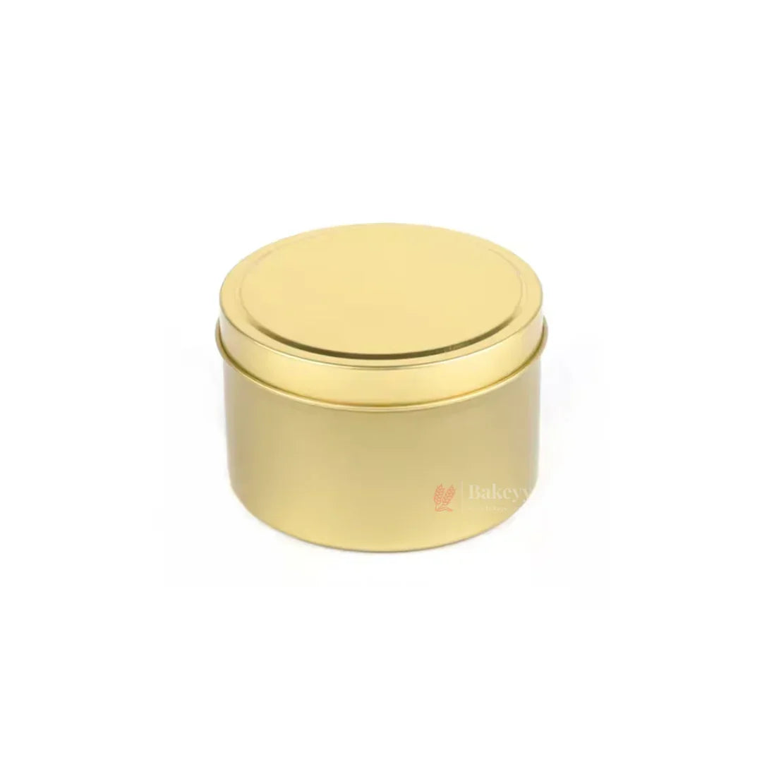 Gold round tin candle box for gift packaging from Bakeyy wholesale baking supplies