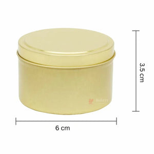 Gold round candle tin box 6x3.5 cm for gift packaging, available at Bakeyy India.