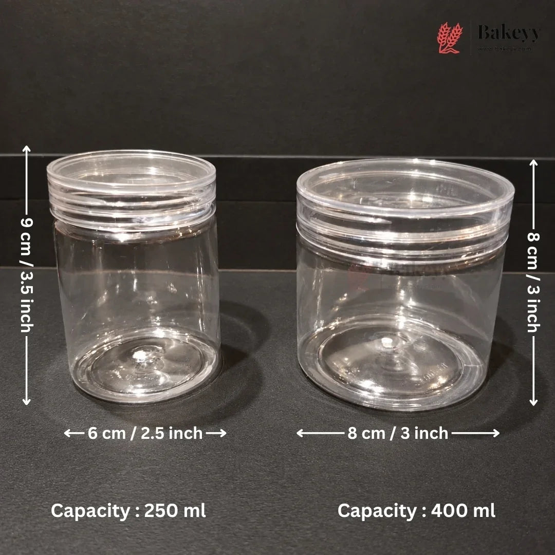 Two clear plastic jars with screw-on lids shown on a dark background, with dimension arrows and text indicating sizes: one 6 cm by 9 cm, capacity 250 ml; the other 8 cm by 8 cm, capacity 400 ml. A Bakey logo appears in the top right.