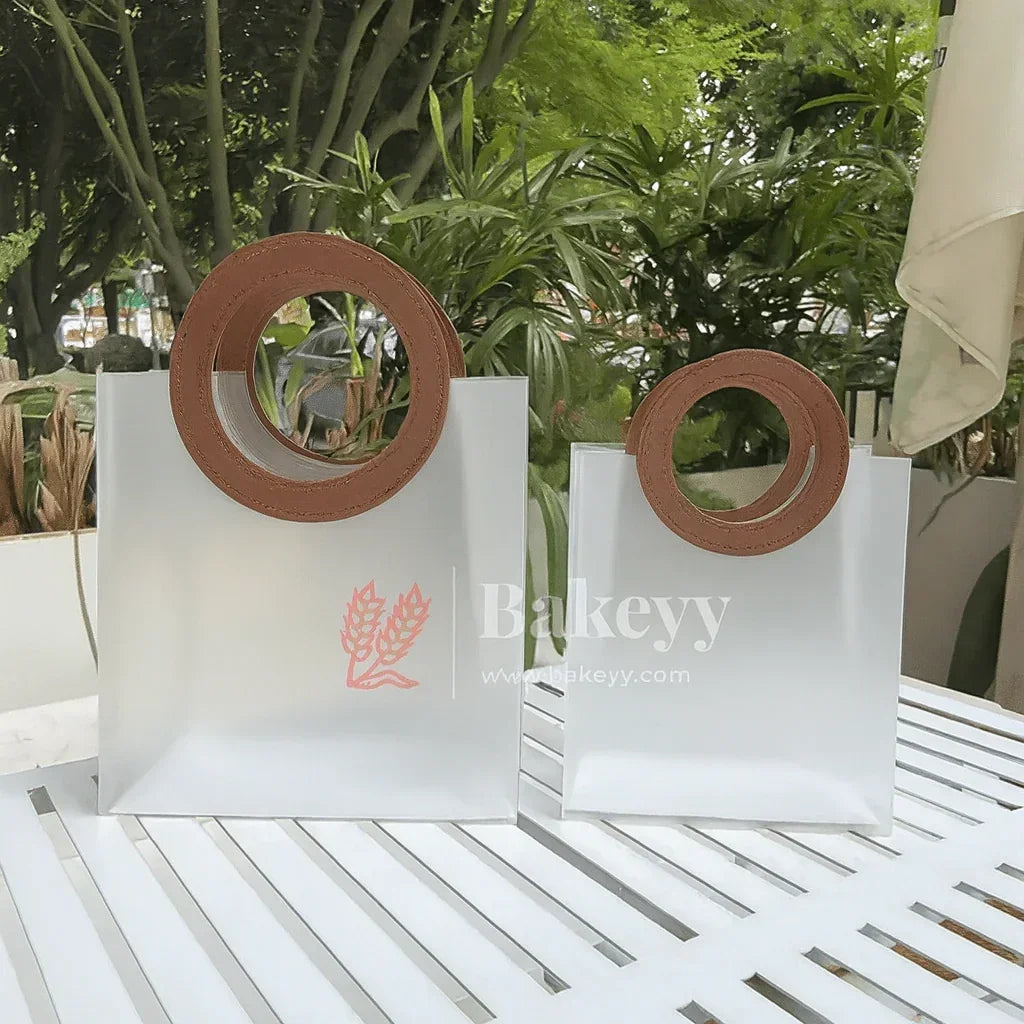 Transparent Bags With Leather Style Brown Colour Handles | Pack of 12 - Bakeyy.com - India - Transparent Bags With Leather Style Brown Colour Handles | Pack of 12 - 22x21x11Cm