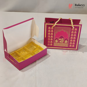 A magenta and gold bakery gift box set, featuring an open box with a six-compartment gold tray inside and a matching closed tote bag with gold handles and ornate arch illustrations, displayed on a white surface.