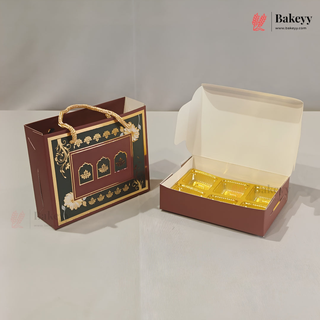 A brown bakery gift box set shown on a light gray studio background, including a closed decorative paper bag with gold rope handle and an open matching box containing six individually wrapped pastries.