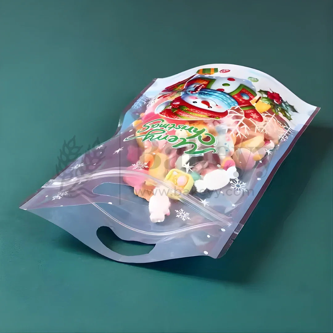 Packaged gummy candies with colorful label on a green background