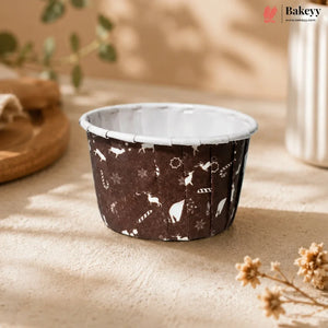 Small round container with animal pattern on a beige surface, featuring the brand 'Bakeyy'.