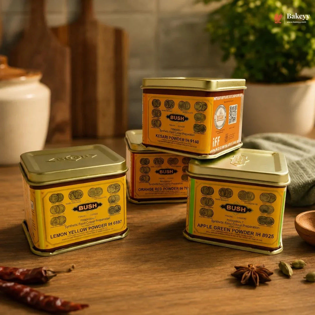 Collection of Bush powder tins on a wooden surface with a blurred background
