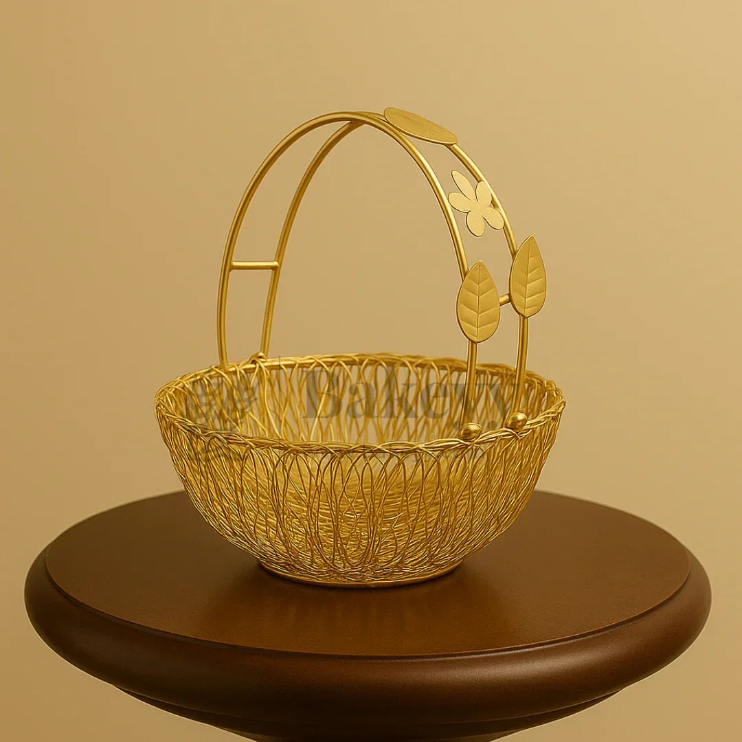 Gold wire basket with decorative handle, perfect for bakery hamper or gift packaging on Bakeyy.com