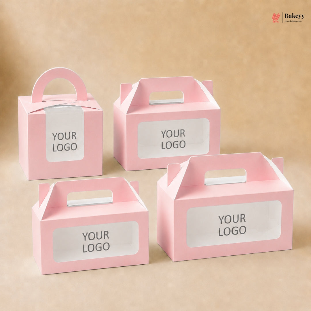 Four pink paper boxes with white labels on a beige background