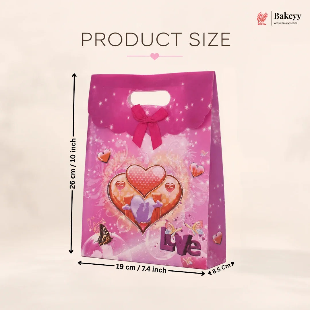 Pink gift bag with heart design and dimensions on a beige background