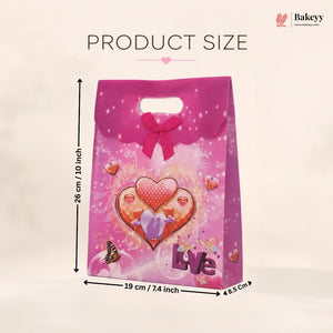 Pink gift bag with heart design and dimensions on a beige background