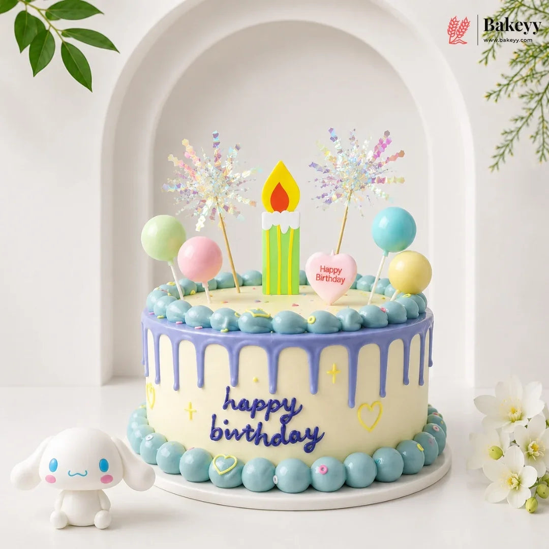 Colorful birthday cake with candles and decorations on a white background, featuring the Bakeyv brand.