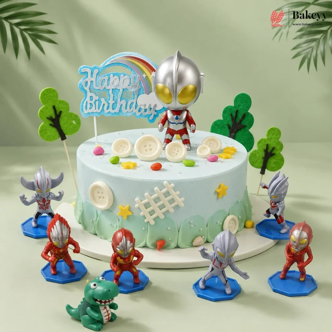 Birthday cake with superhero figurines and 'Happy Birthday' sign on a light green background