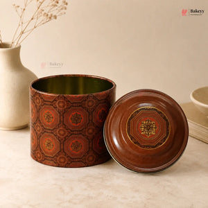 Decorative brown tin can with lid on a light surface, featuring the Bakeys brand.