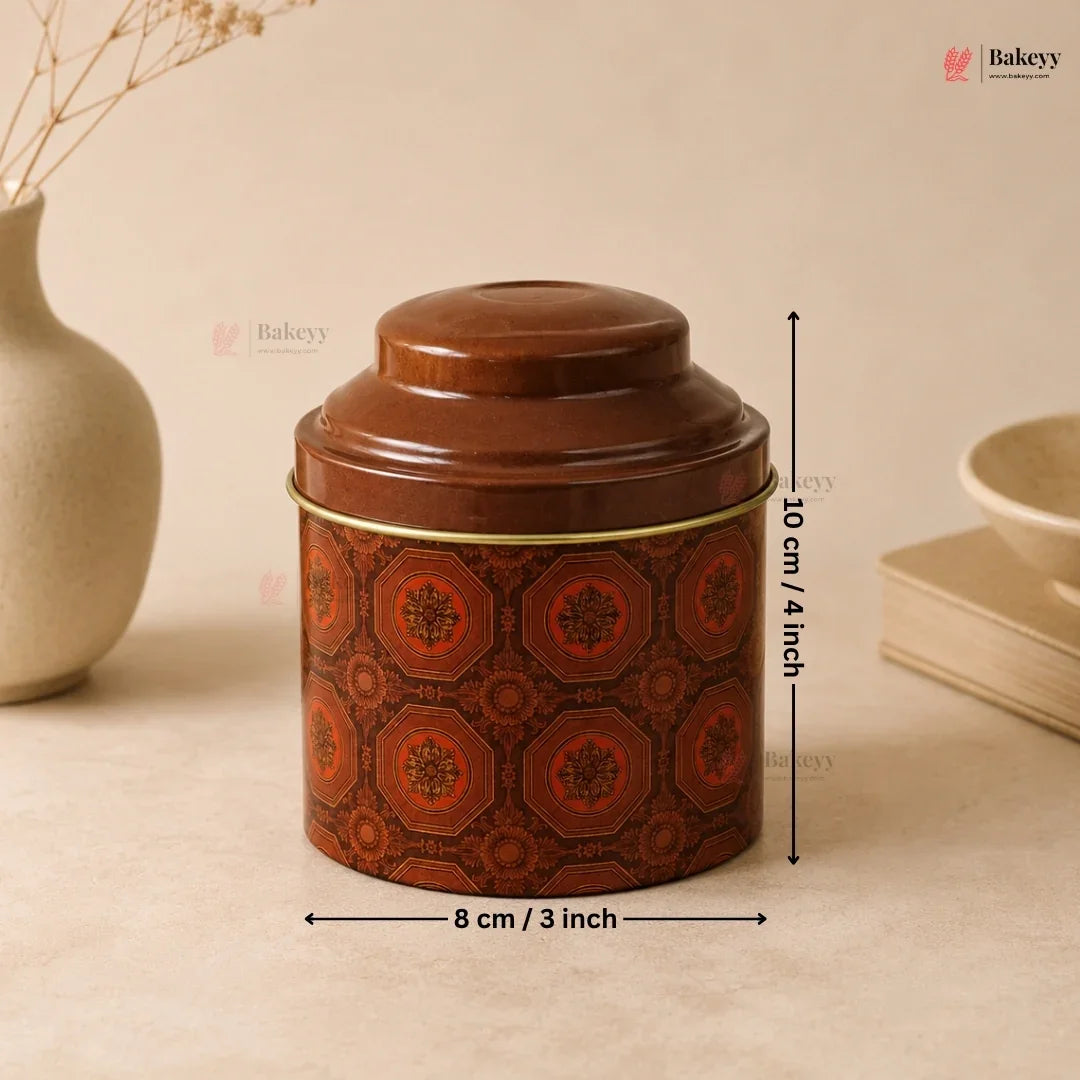 Decorative brown cylindrical container with geometric pattern, shown with measurements on a beige background.