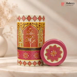 Decorative cylindrical tin with floral patterns on a beige background, featuring the Bakeyy brand.