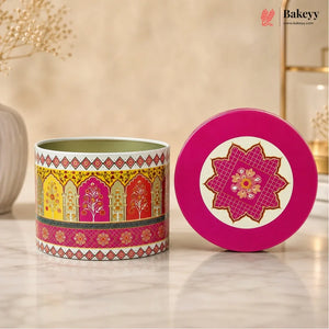 Decorative tin can with colorful patterns on a beige background, featuring the brand 'Bakeyy'.