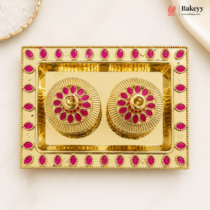 Gold and pink decorative item with 'Bakeyy' branding on a white background