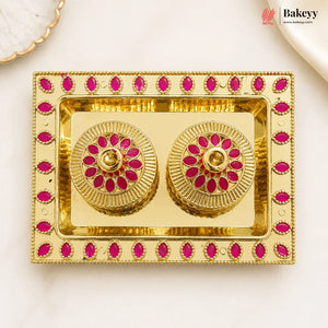 Gold and pink decorative item with 'Bakeyy' branding on a white background