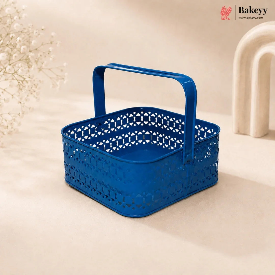 Blue perforated basket with handle on a beige background, featuring the Bakeyy brand.