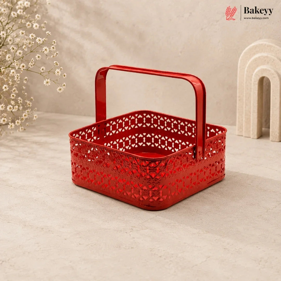 Red decorative basket with intricate patterns on a beige background, featuring the Bakeyy brand.