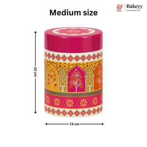 A medium-sized cylindrical container with a bright pink lid and a colorful ornate patterned body, shown on a white background with dimension arrows indicating 8 cm height and 7.5 cm width.