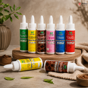 Assorted bottles of Colour Dust on a wooden surface with a neutral background