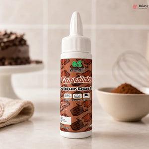 Bottle of chocolate color dust on a kitchen counter with baking ingredients in the background
