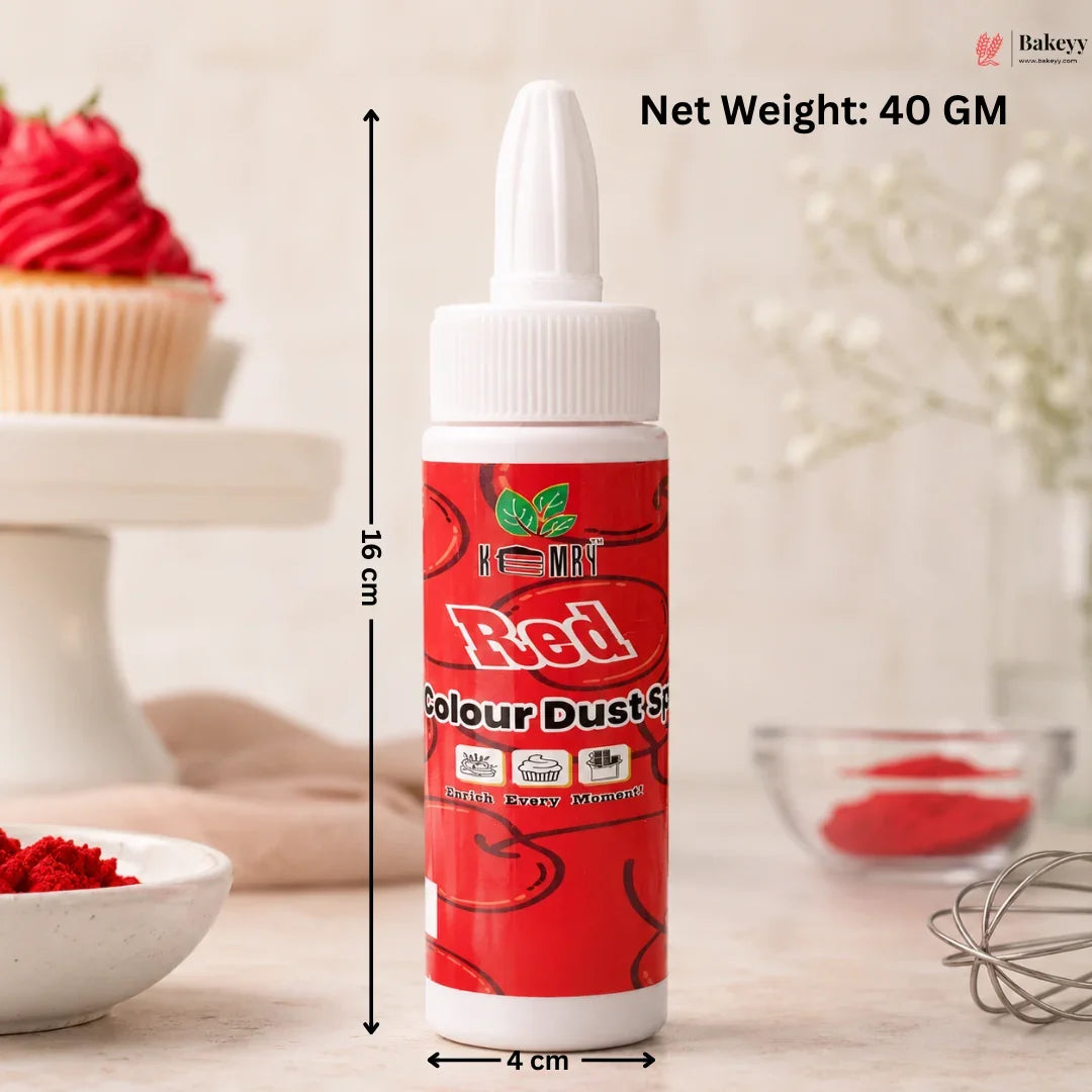 Red food color bottle with measurements and a cupcake in the background