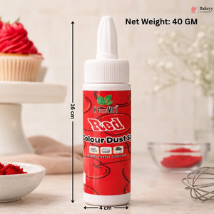 Red food color bottle with measurements and a cupcake in the background