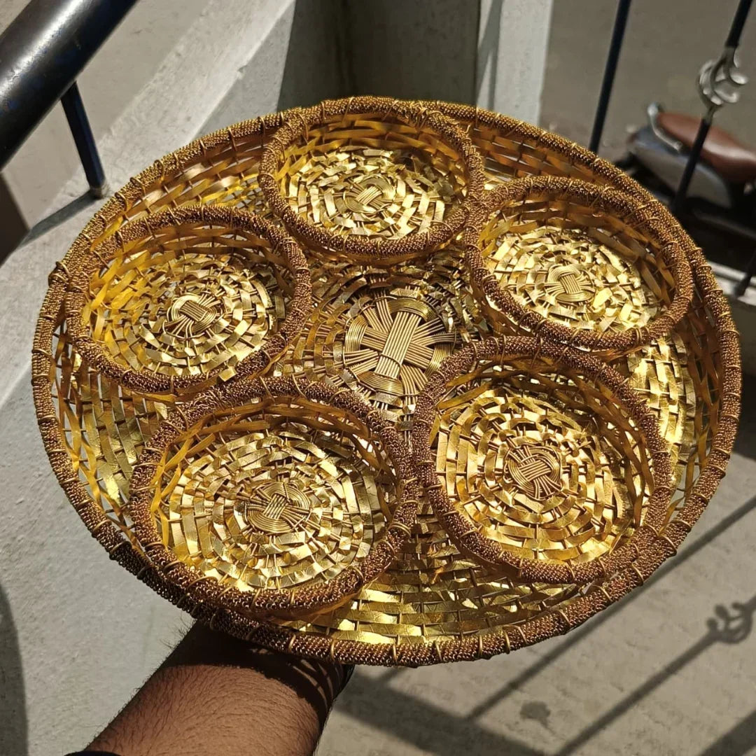 Gold woven dry fruit tray with six round compartments for festive gift packaging