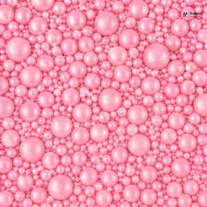Pink pearl-like beads with a visible brand logo in the corner.
