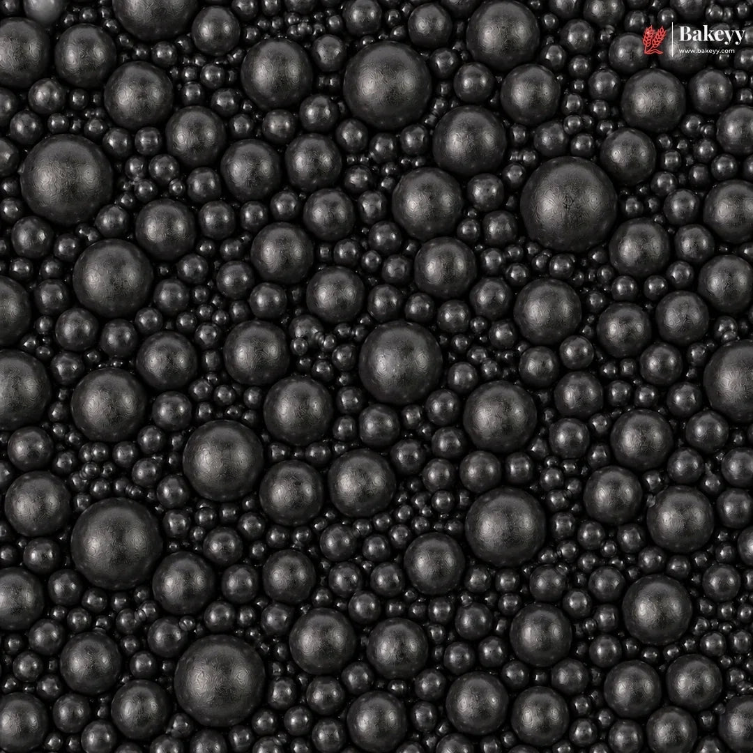 Close-up of black pearls with 'Bakeyes' branding in the corner.