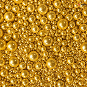 Close-up of gold spherical beads of various sizes.