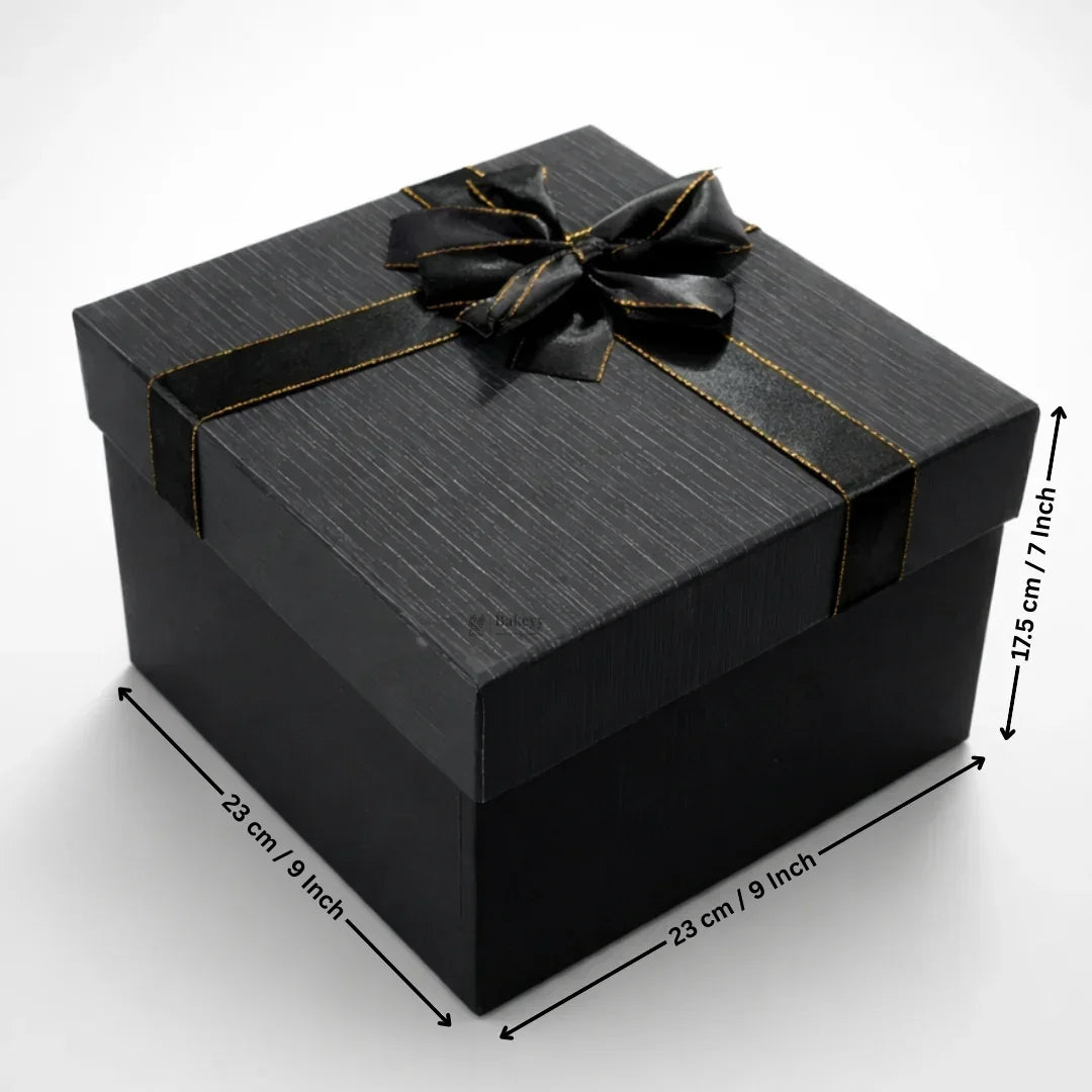 Elegant black and grey gift box with gold ribbon from Bakeyy, 23x23x17.5 cm, gift packaging.