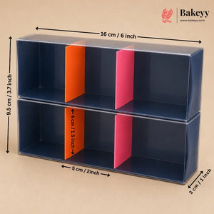 A clear plastic double-tiered display box with dark blue interior dividers, shown with dimension arrows and labels indicating 16 cm by 9.5 cm by 5 cm measurements on a beige background.