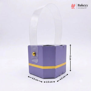 Purple hexagonal box with a clear dome lid and gold accent, featuring dimensions on a white background.