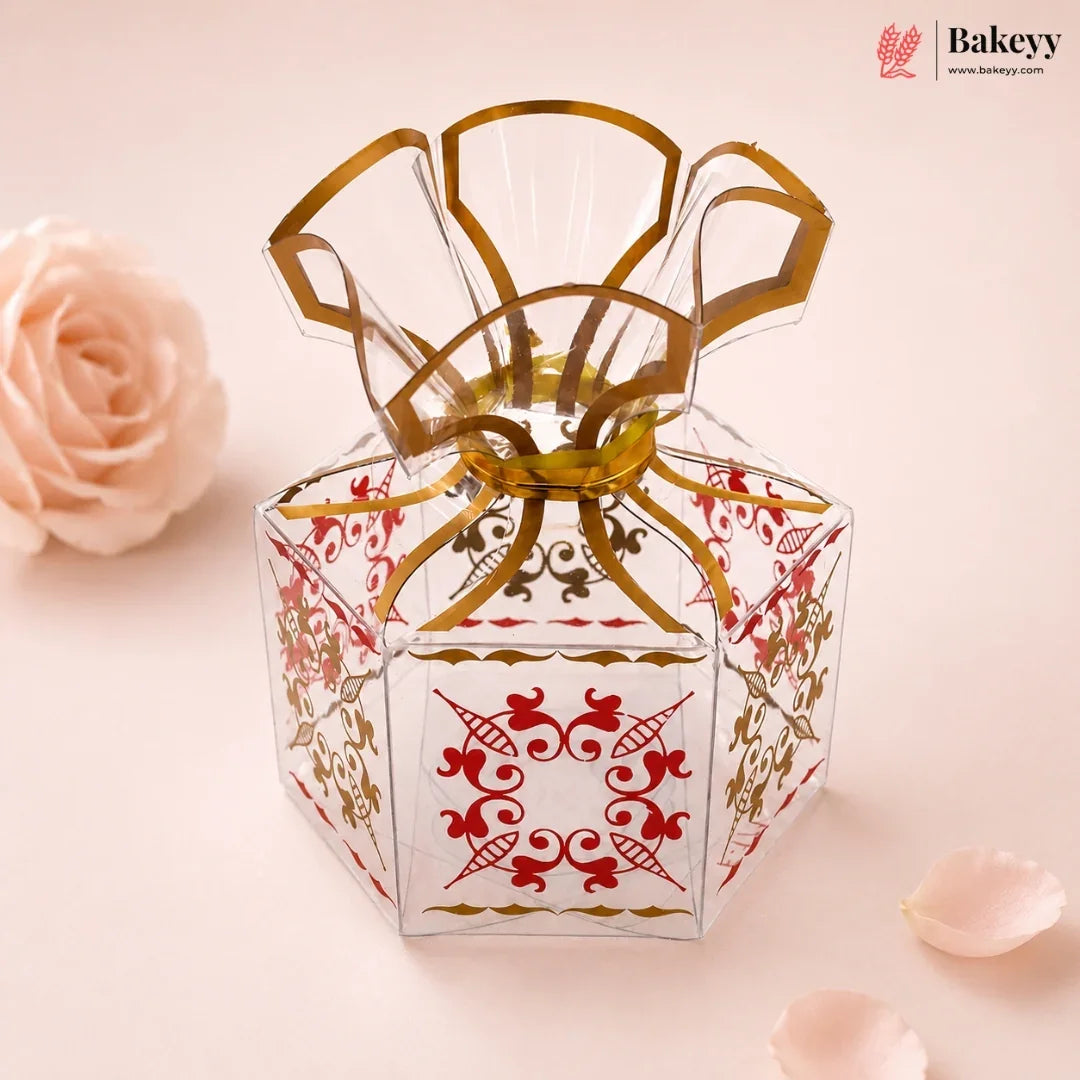 Decorative gift box with floral design on a soft pink background