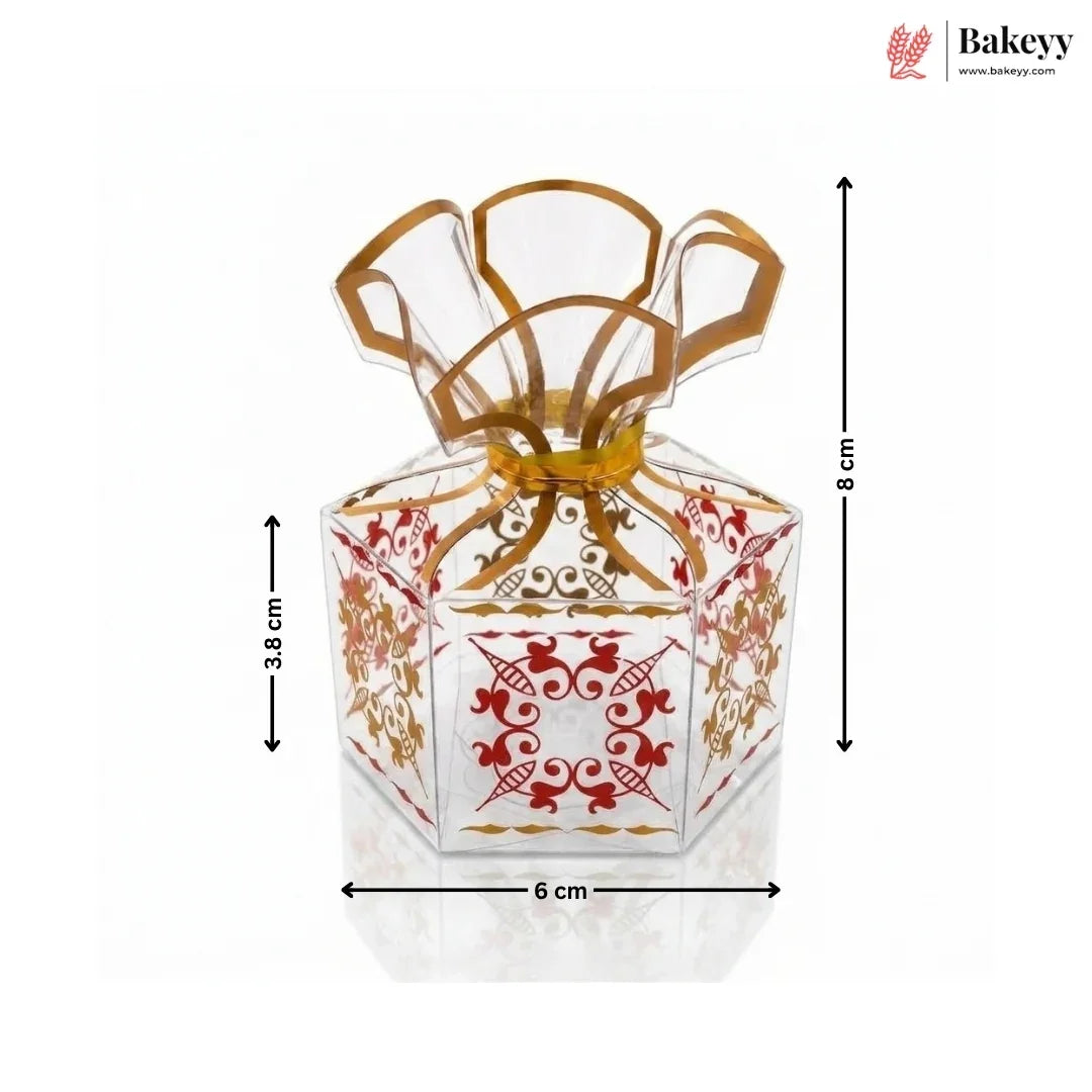 Decorative glass container with gold and red patterns, shown with dimensions on a white background.