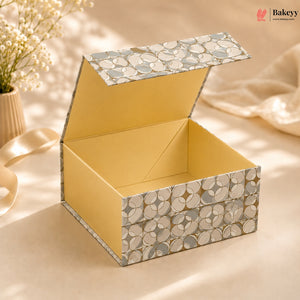 Decorative box with floral pattern on a light background, featuring the brand 'Bakeyy'.