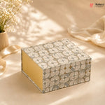 Decorative box with floral pattern on a soft background, featuring the brand 'Bakeyy'.