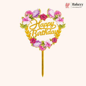Floral 'Happy Birthday' cake topper with colorful flowers on a white background, branded 'Bakeyy'.