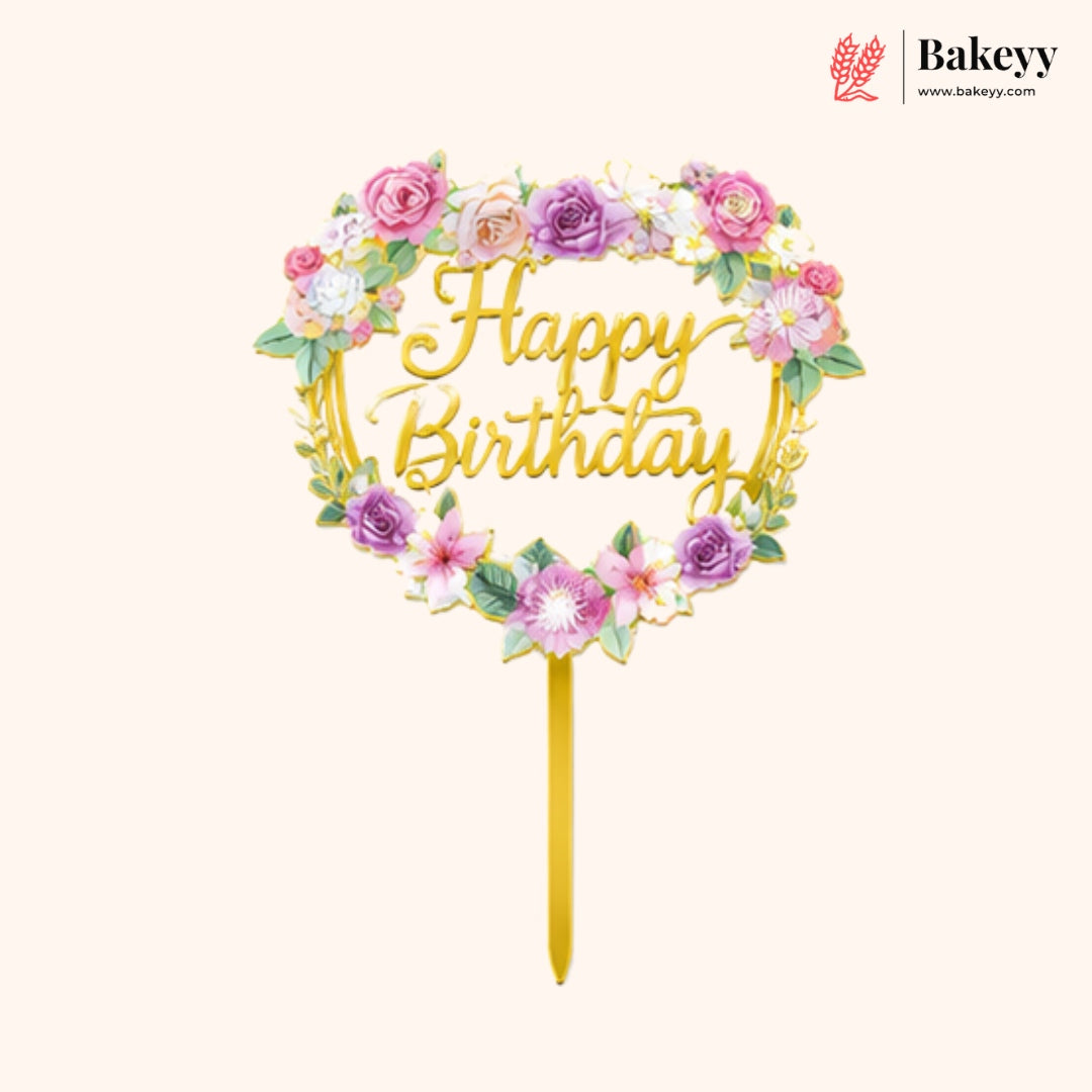 Floral 'Happy Birthday' cake topper with colorful flowers on a white background, branded 'Bakeyy'.