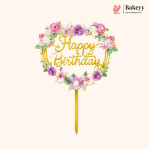 Floral 'Happy Birthday' cake topper with colorful flowers on a white background, branded 'Bakeyy'.