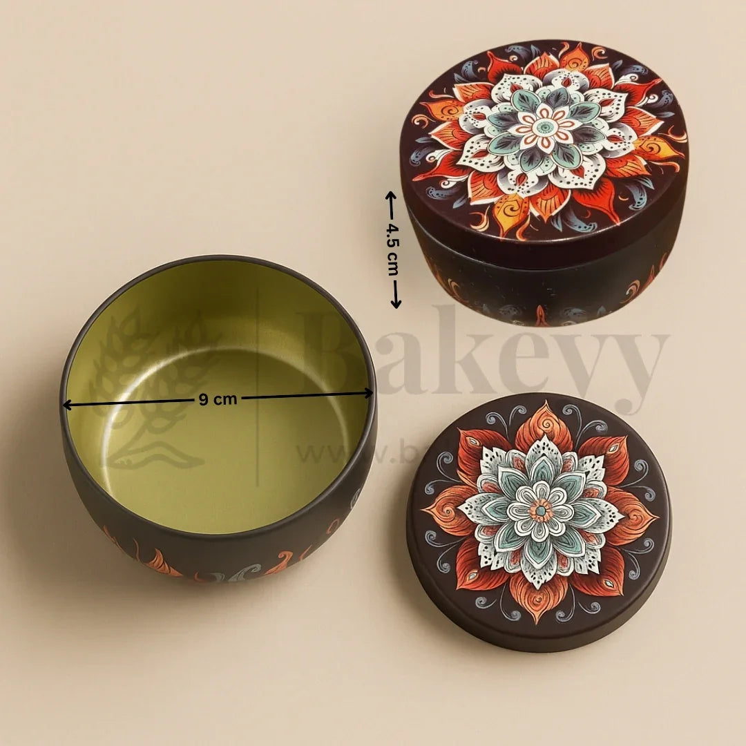 Decorative round container with floral design, open to reveal a green interior, on a beige background.