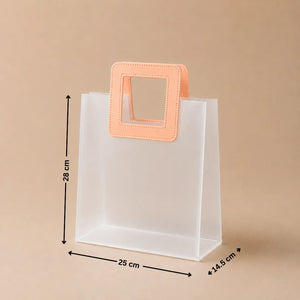 Clear plastic bag with a pink handle and measurements on a beige background