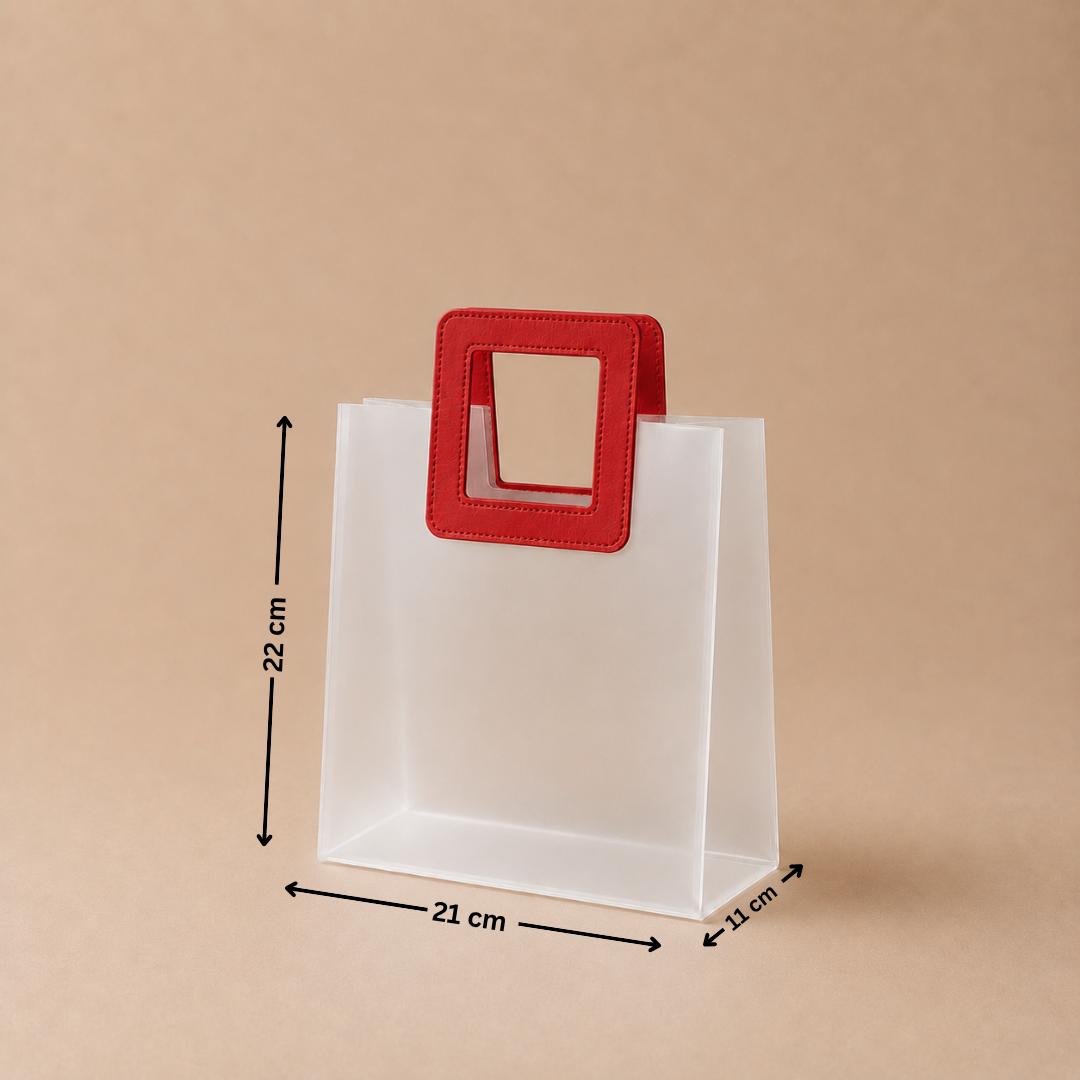 White paper bag with a red handle and measurements on a beige background