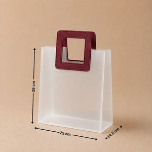 White paper bag with a red handle and measurements on a beige background