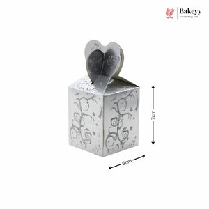 Silver decorative box with heart-shaped lid on a white background, featuring dimensions and the brand 'Bakey'.