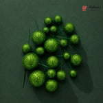 Green decorative balls on a dark green background with 'Bakeyy' branding.